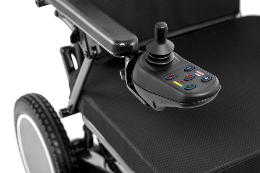 Porto Mobility Ranger SpacePro Recliner reclining folding power wheelchair, joystick and armrest close up