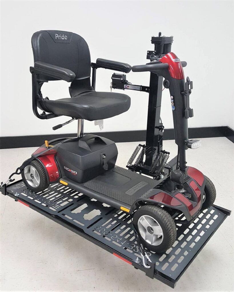 Pride Go Go travel scooter strapped onto the Model 210 platform