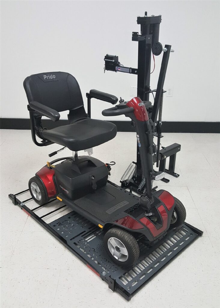 Mobility scooter loaded and secured on the Hold N Go US218 platform